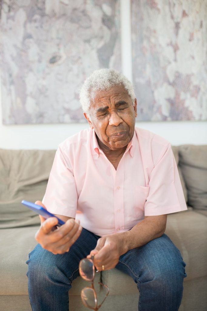 elderly man appearing confused and distressed