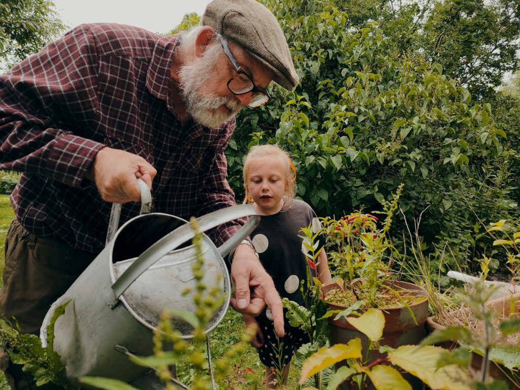 Easing apathy and withdrawal in dementia by watering plants together on a Florida porch