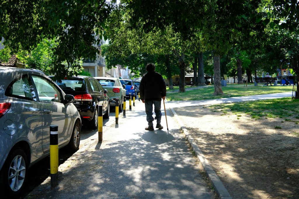 A companion setting out lunch step by step with an older woman living with vascular dementia