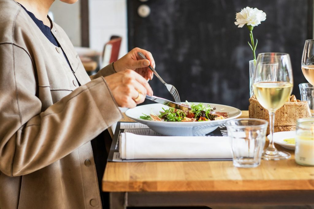 Safe meals with dysphagia: a companion sitting with an older man during an unhurried lunch