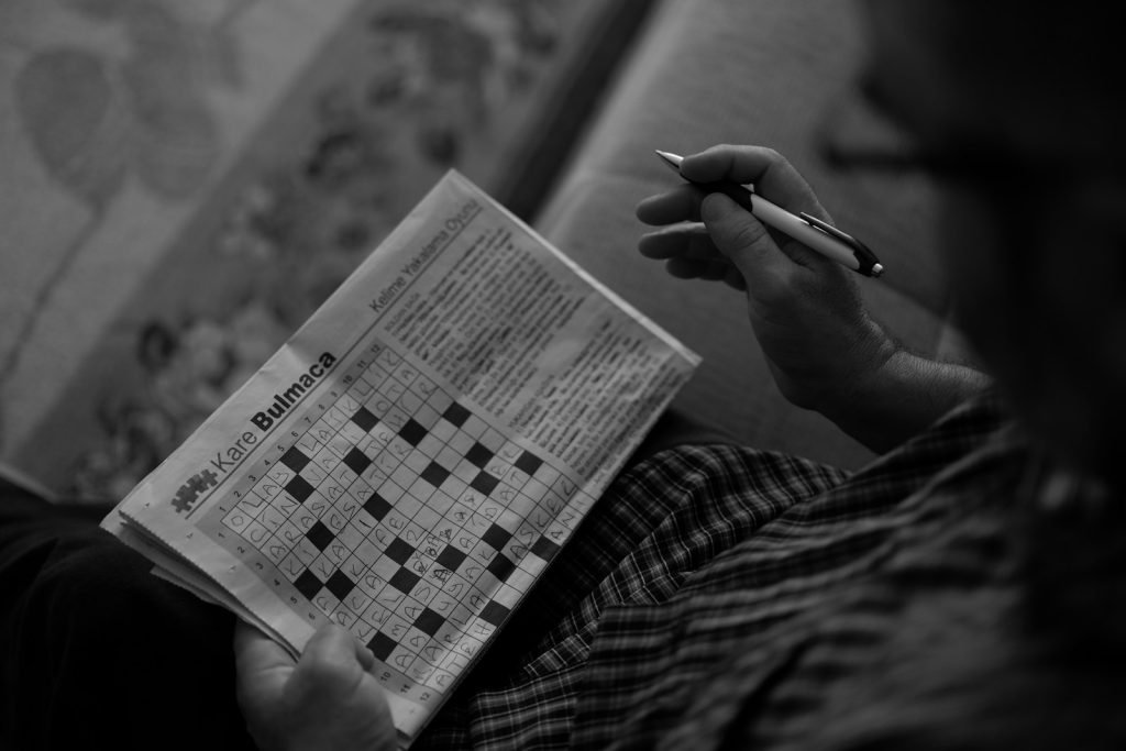 Staying active with mild cognitive impairment: an older woman and a companion at a community class