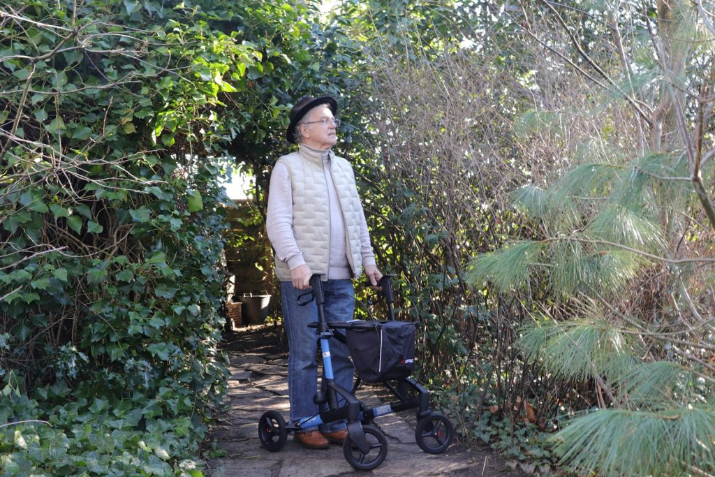 Safe walks reduce wandering: a companion and an older woman strolling together near home