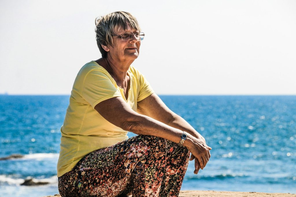 Two friends walking together, a simple self-care habit for dementia caregivers