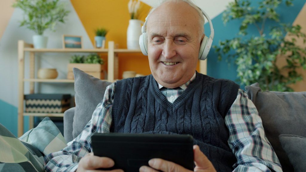 A daughter singing along, using music to connect with a loved one with dementia