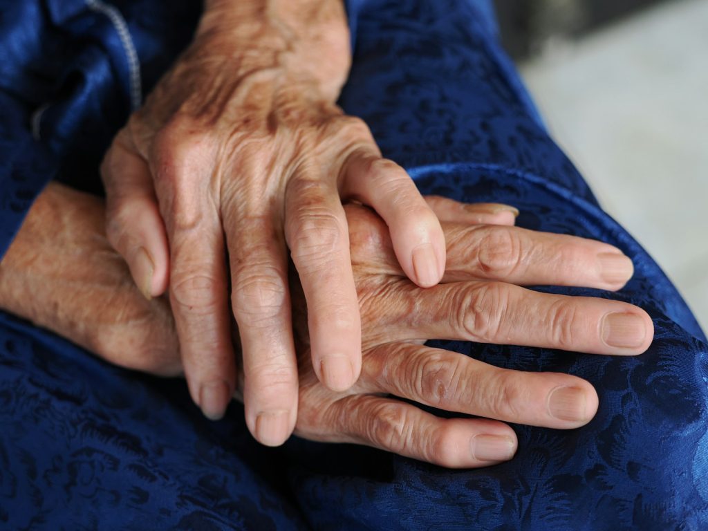 A daily check for skin problems in dementia with soft cushions and a comfortable chair